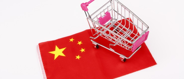 ping shopping cart on China flag - buying in china concept