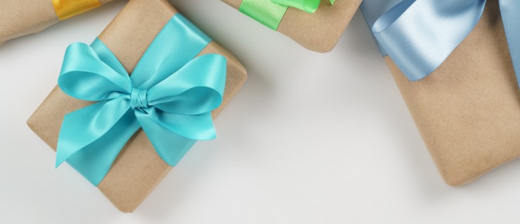 present boxes on white background shot from above, border composition