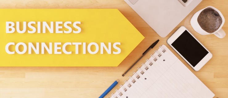 Business Connections - linear text arrow concept with notebook, smartphone, pens and coffee mug on desktop - 3d render illustration.