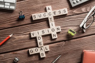 Words of business marketing collected in crossword with wooden cubes