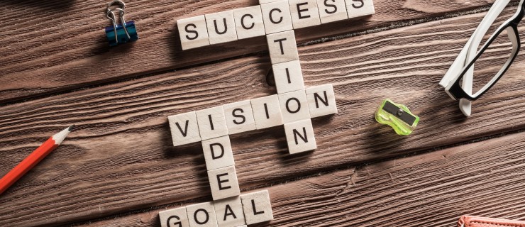 Words of business marketing collected in crossword with wooden cubes